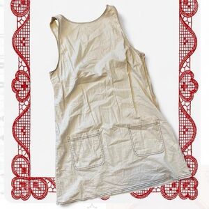 Cream backless pocket contrast stitch mini dress